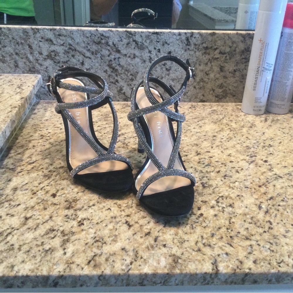 Giani Bini black  w/ silver accents. Ankle straps size 9 4inch heel